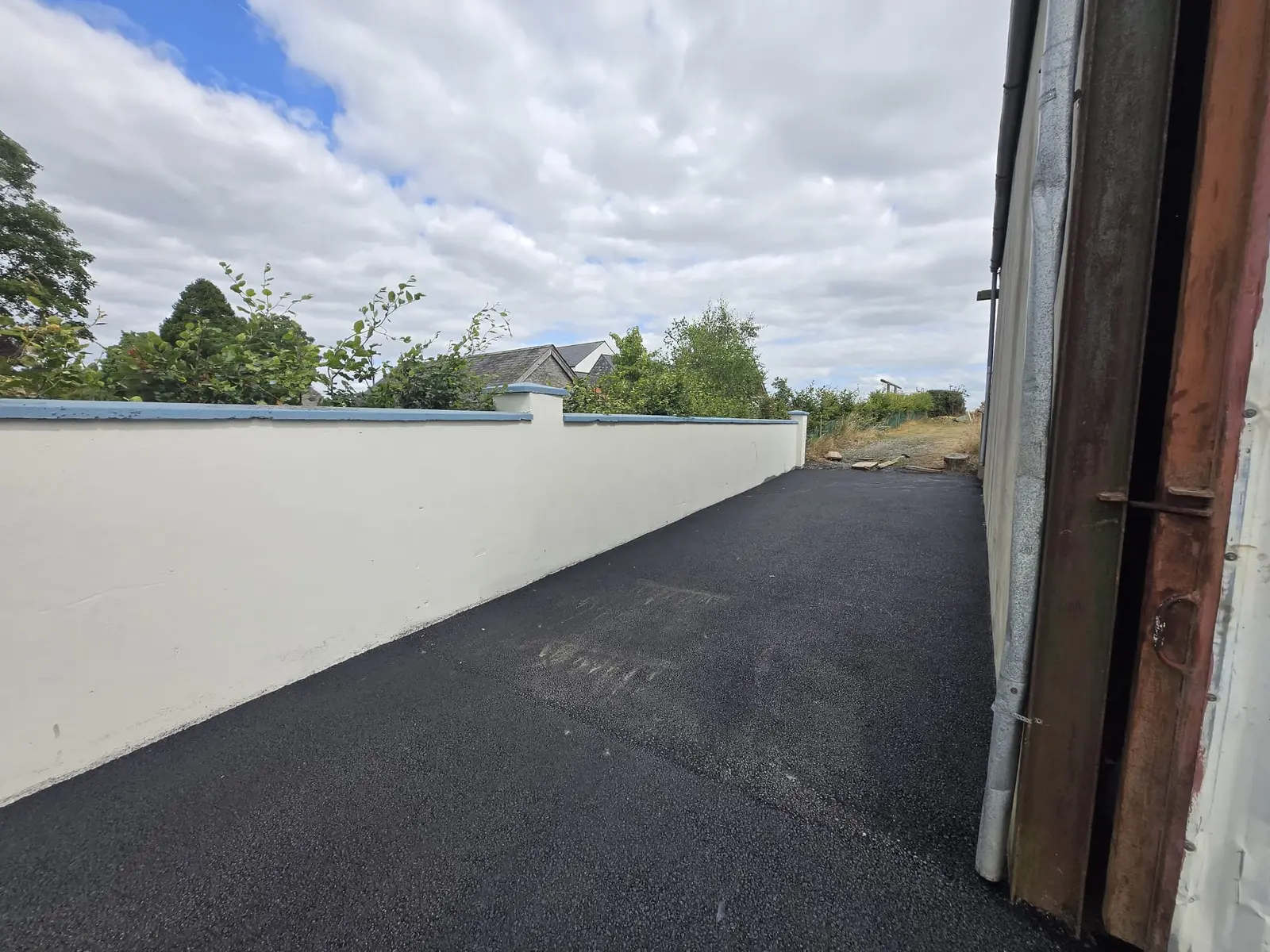 Wide Asphalt Driveway project by Allsurface Groundworks in County Dublin
